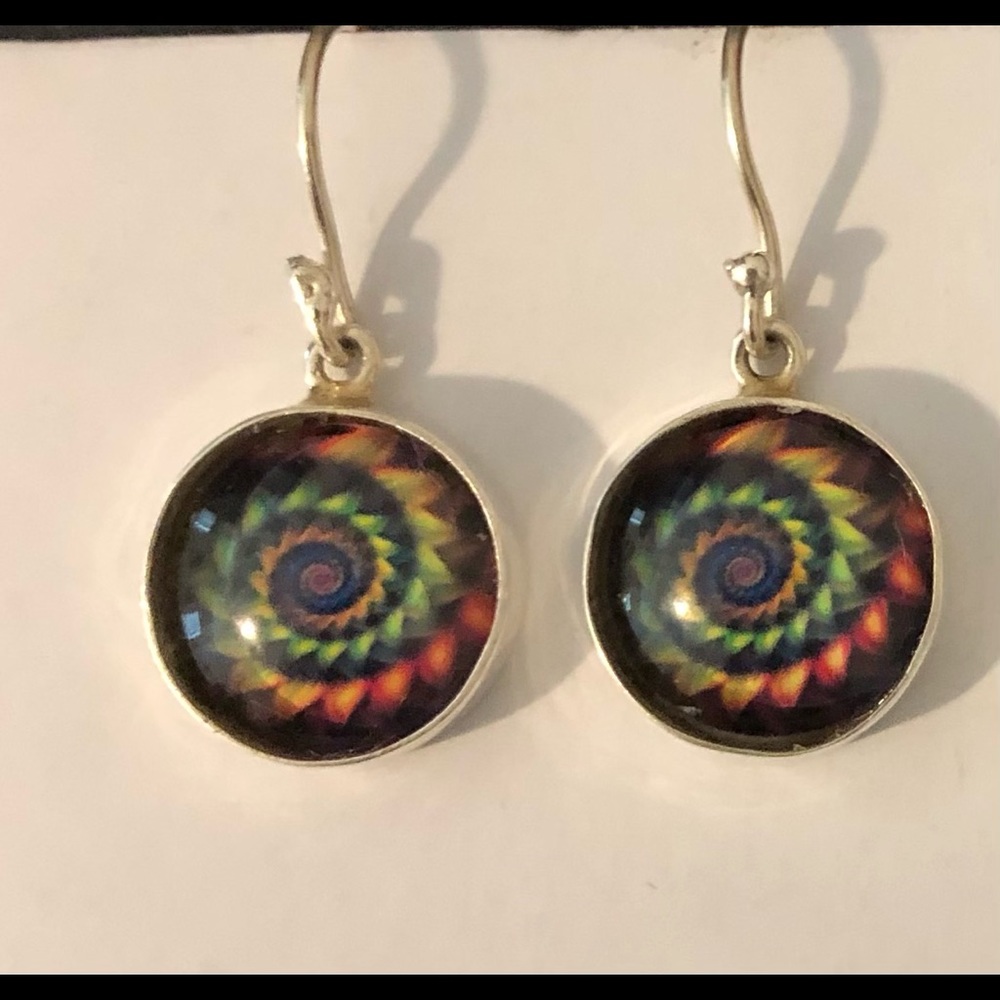 Earrings in silver bezel